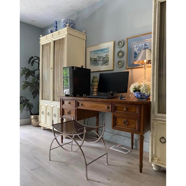 Hollywood regency style metal / chrome vanity stool or bench from the 1960’s. This piece is welded and does not disassemble
