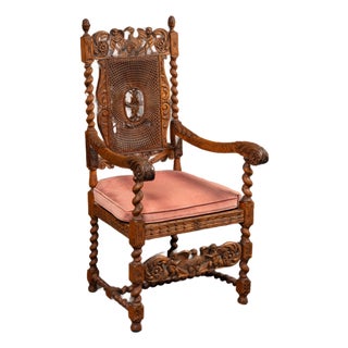 19th Century Ornate Carved Throne With Intricate Cane Backrest For Sale