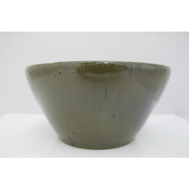 Vintage earthenware bowl hand-thrown by Kenneth George at the historic Cole Pottery shop in Sanford, North Carolina....
