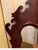 Elegant flame mahogany beveled mirror with Chippendale frame. The shapely molding around the beveled glass. The Swirly...