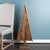Enhance your holiday decor with this Rustic Natural Wood Pine Tree. Crafted from solid pine wood with a distressed natural...