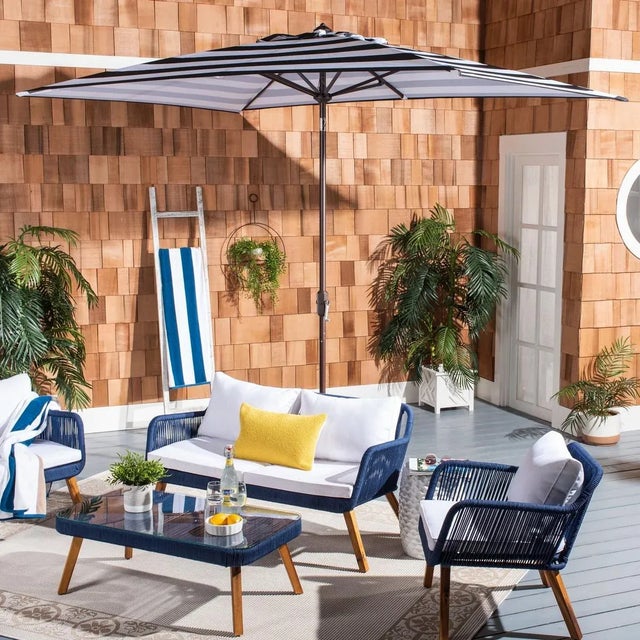 Inspired by the cosmopolitan Art Deco hotels in the heart of Miami Beach, this runway ready market umbrella is absolutely...