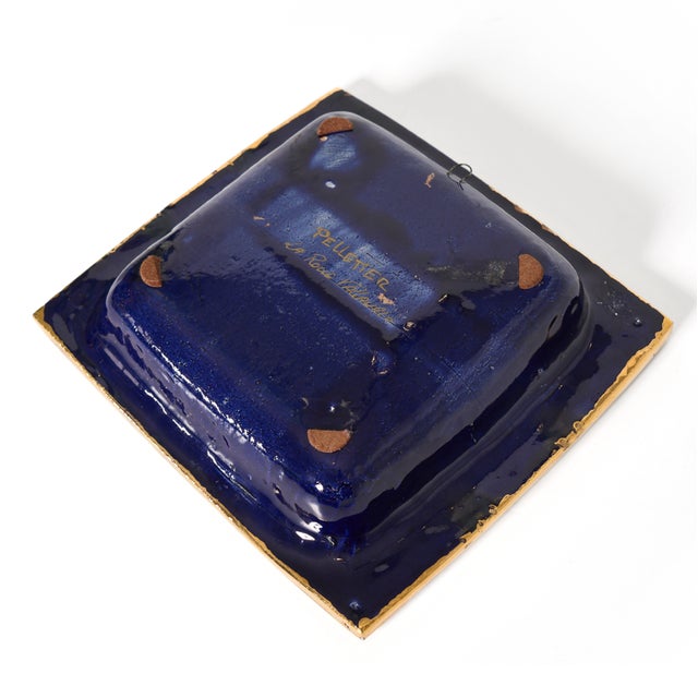 Gorgeous and highly collectible lusterware mid-century modern dish in warm and blue hues by master ceramicist Georges...