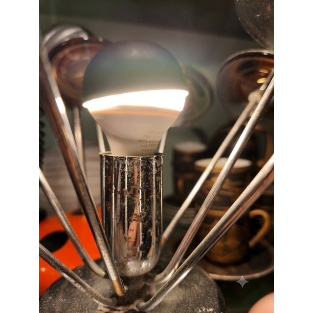Mid-Century Chrome and Greenish-Grey Glass Bouquet Table Lamp, 1970s, in Good conditions. Designed 1970 to 1979 European...