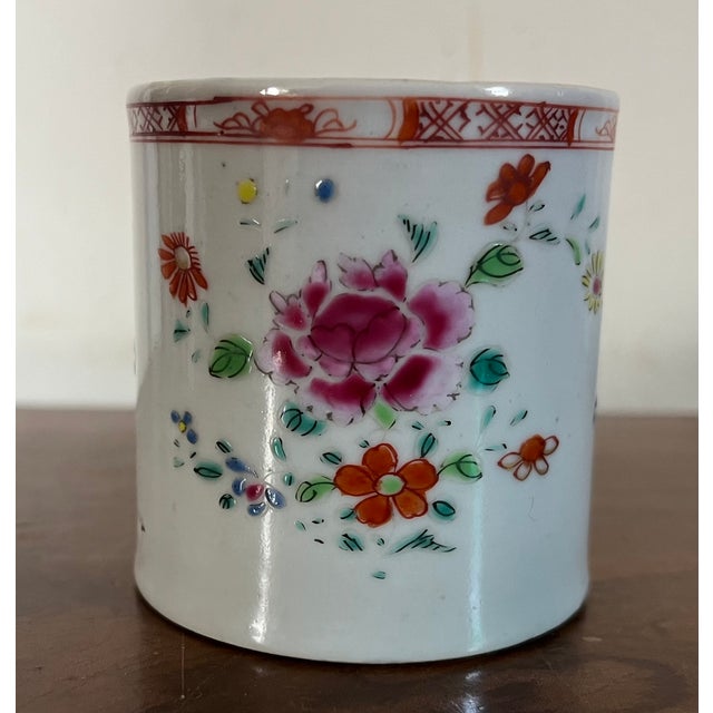 Small antique 18th century Chinese export porcelain famille rose mug or coffee can. Decorated with floral sprig. Measures...