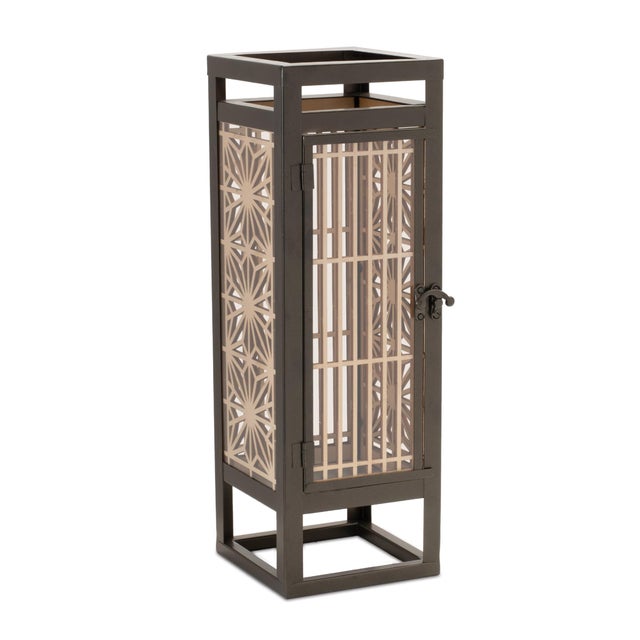 Elevate your decor with the Cut-Out Wood Candle Holder, a perfect fusion of modern design and natural materials. Standing...