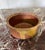 Beautifully glazed ceramic bowl. Green and brown tones play over this nice bowl. It can be used for storage, or display of...