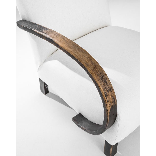 Add a touch of Art Deco elegance to your home with this stunning 1930s Czech Wooden Armchair by J. Halabala. Renowned for...
