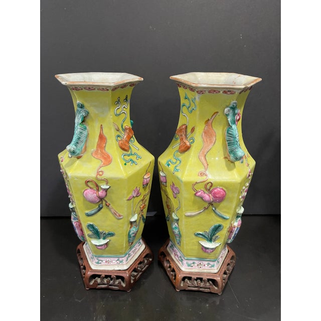 Chinese Pair of Chinese 19th Century Famille Rose High Relief Yellow Ground Porcelain Vases For Sale - Image 3 of 7