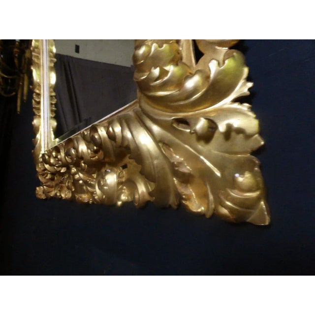 Baroque carved wood mirror and gilded. decors acanthus leaves. Italian work of the late nineteenth century. Dimensions:...