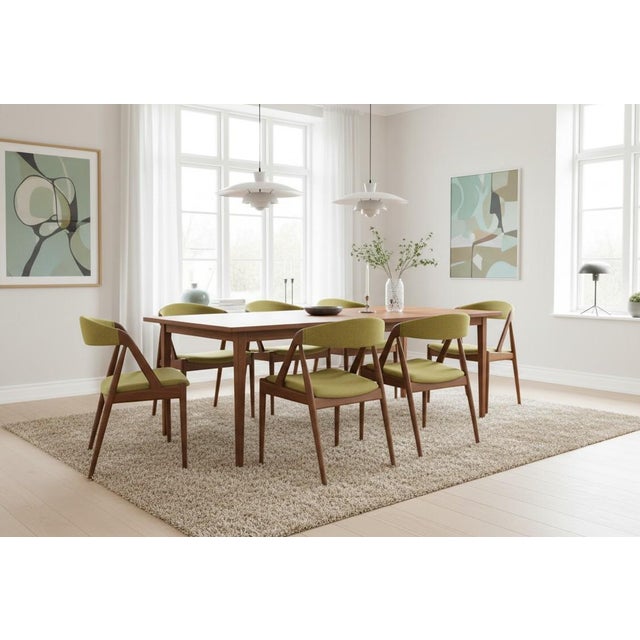 A fantastically elegant and solidly well-made chair designed by Kai Kristiansen for Schou Andersen, Denmark. Model 31 is...