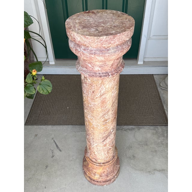 Offering for sale this beautiful solid Italian pink marble column pedestal with the following fine features: - Made of...