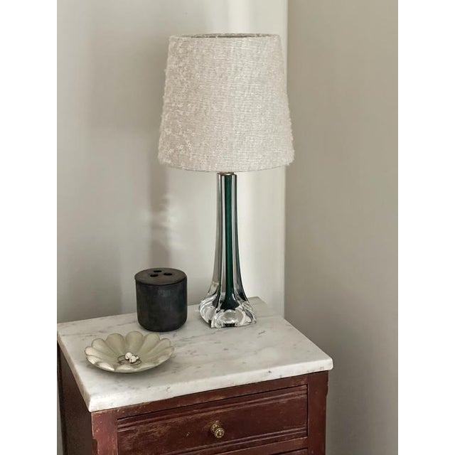 Elegant Swedish Mid-Century Modern Sommerso style table lamp in green and clear glass. Pieces of art glass! Design by...