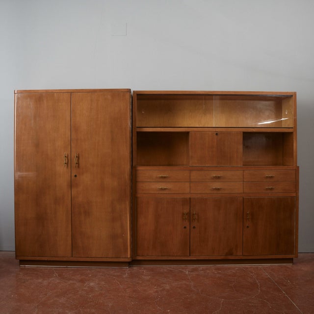 This vintage 1940s art deco-style mobile bookcase/sideboard for offices and studios is a significant piece of modern...