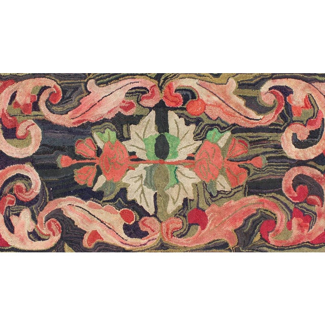 Charcoal, red, and green antique American Hooked rug with large flower design. Keivan Woven Arts / rug ML-500, country of...