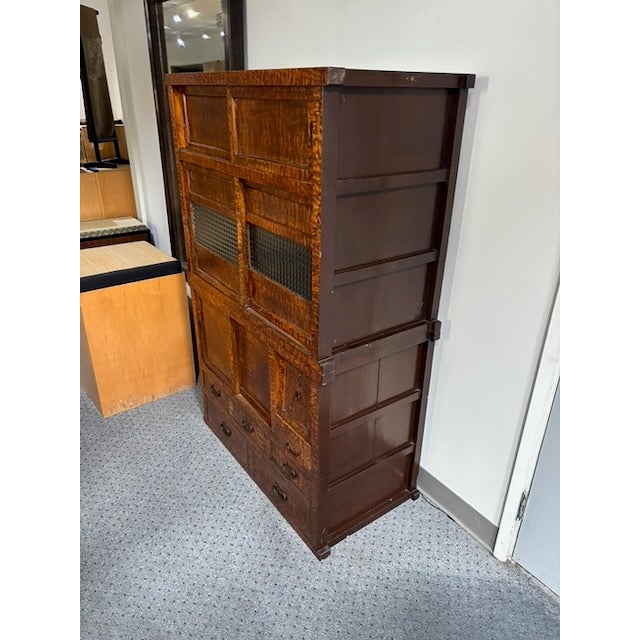 An exceptional early 20th-century Japanese Cha Tansu (traditional tea cabinet) dating from the Taisho period (1912–1926)....