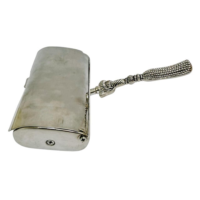 Elevate your post-dinner service with this sophisticated vintage table crumb sweeper (ramasse-miettes) by the French...