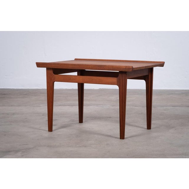 Elegant teak coffee / side table designed by Finn Juhl and produced by France & Daverkosen in Denmark during the 1950s,...