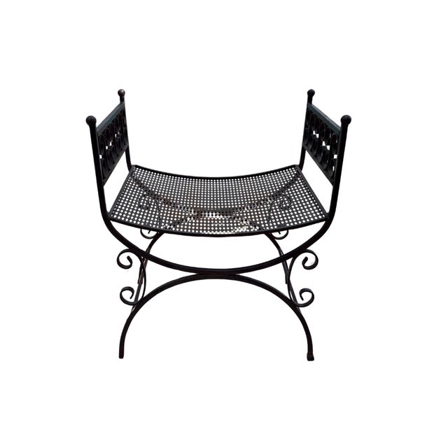 Vintage wrought iron garden stool in the style of Arthur Umanoff’s Granada collection, featuring elegant scrollwork, a...