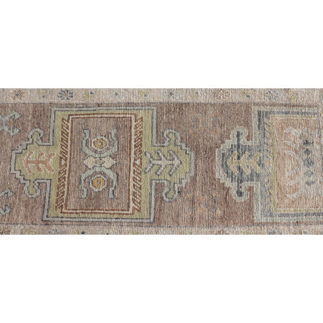 Textile Long Turkish Oushak Runner in Pale Taupe With Blue and Soft Green Motifs For Sale - Image 7 of 12