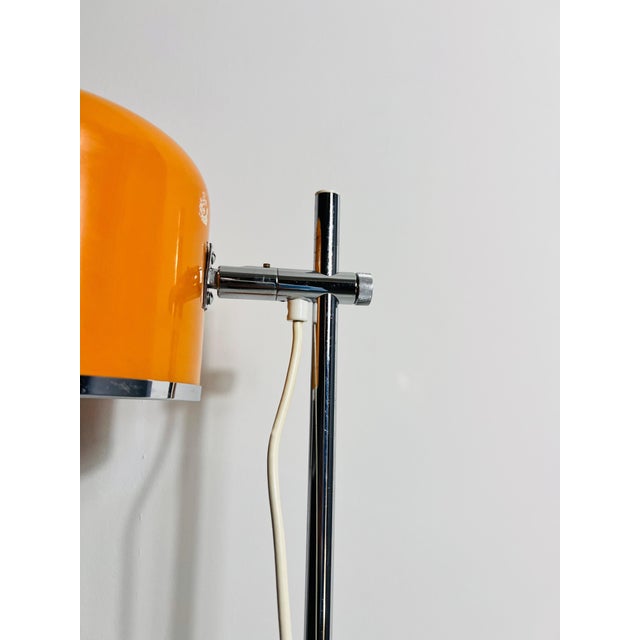 This is a mid-century floor lamp, expertly crafted in Germany during the 1970s by the renowned manufacturer Staff. The...