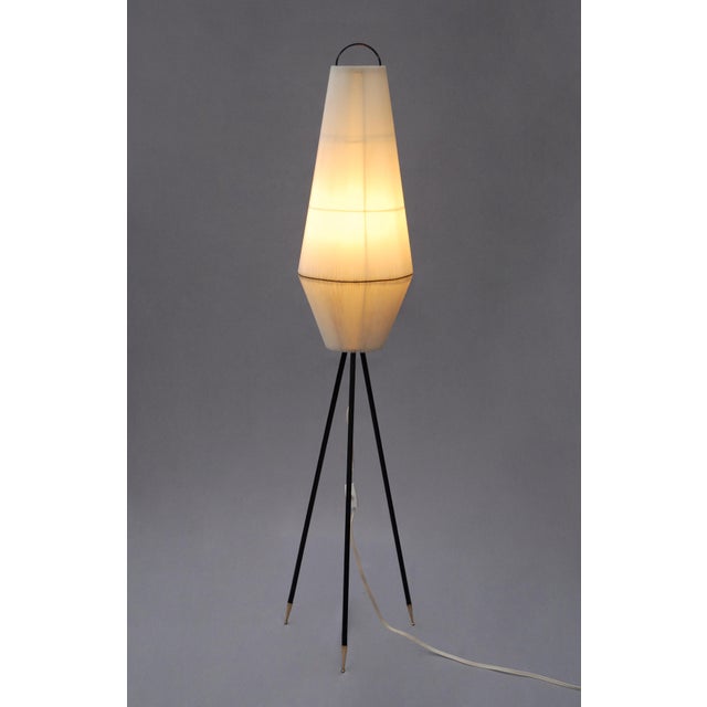 Tripod floor lamp attributed to aro-leuchten, west germany. white pleated plastic shade with a steel wired framed....