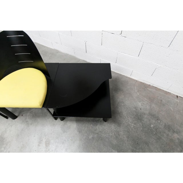 Set of two armchairs and matching coffee table, designed by Patrice Bonneau and manufactured by Genexco in 1980. All three...