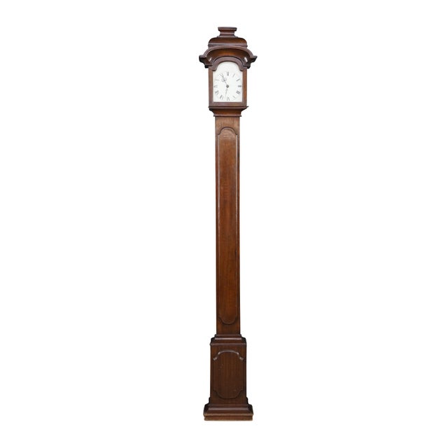 This Rare vintage 1972 longcase or grandfather clock by Chapman (3593G Pier Case Clock) showcases a refined Federal...