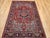 "An exceptional hand-knotted Persian Heriz Serapi rug from the early 20th century, this piece embodies the refined...