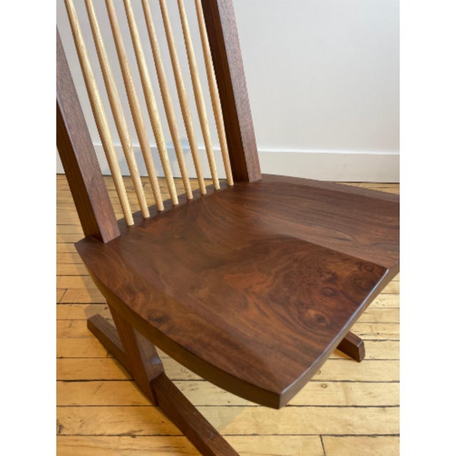 A Nakashima Conoid Lounge Chair. Chairish