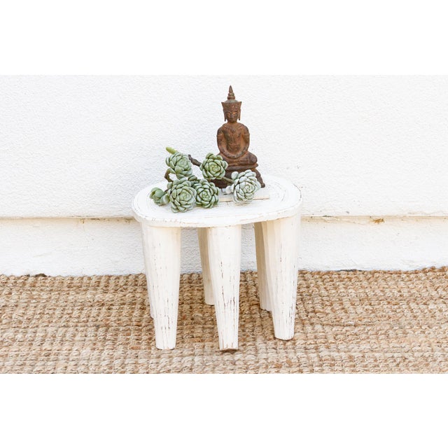 A unique piece of African art, this vintage Nupe table from Nigeria is a must-have for collectors and enthusiasts of Nupe...