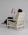 A mid-20th century reclining lounge armchair featuring a structured form with an adjustable backrest. The design...