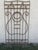 This iron gate/door is a wonderful piece of architecture. Heavy, tight, and sturdy. This piece does show signs of age...
