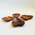 A set of 4 mid century wood dishes, each in the shape of a different card suit. Beautiful grain to the wood. Perfect for...