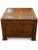 A handsome vintage Mediterranean Revival–style cabinet end table featuring a warm medium-brown finish, substantial paneled...