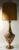 Chic and stylish Mid-Century table lamp having a multi tone metallic glaze textured surface with textured and fluted body....
