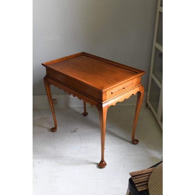 Vintage Eldred Wheeler Tiger Maple Tea Table. Measures 18W x 28D x 26.75H Gorgeous vintage condition. Has two pull out...