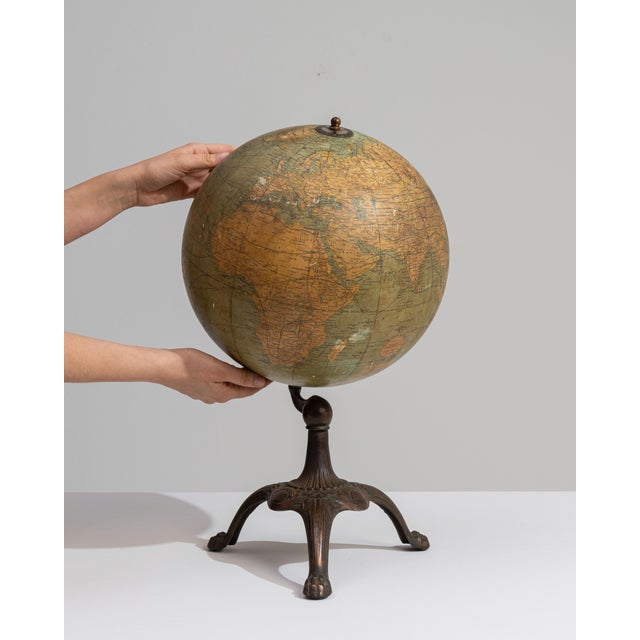 This 19th century globe from United States is finished in brown and green, worked in iron. It is distinguished by its cast...