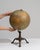 This 19th century globe from United States is finished in brown and green, worked in iron. It is distinguished by its cast...