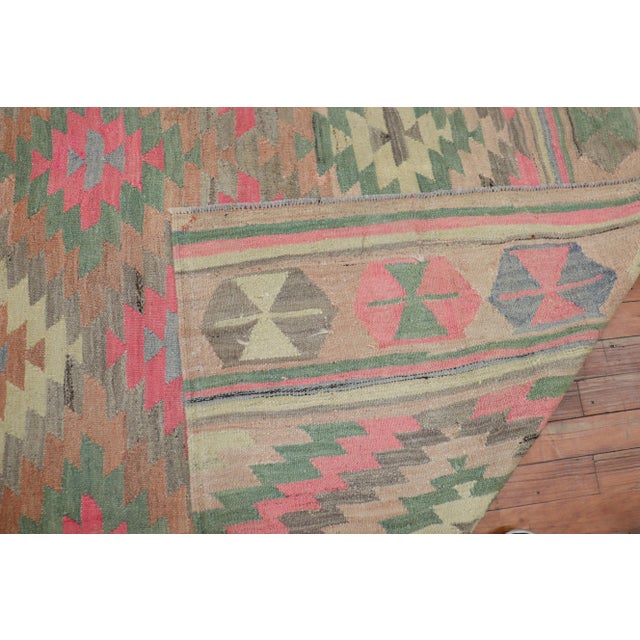 One of a kind, mid 20th-century Hand-knotted bohemian chic turkish kilim in bright poink. Professionally Washed &...