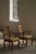 A stunning pair of oak armchairs designed by Henning (Henry) Kjærnulf for E.G. Møbler, Denmark, circa 1960s. Crafted in...