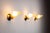 This vintage set of three brass sconces embodies classic elegance and decorative craftsmanship. Each sconce is made from...