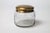 Vintage glass vanity jar with etched brass lid. No makers mark. Minor age wear. Patina.