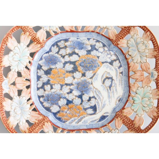 A gorgeous rare 19th-Century Japanese Imari porcelain octagonal reticulated charger plate or dish with hand painted floral...