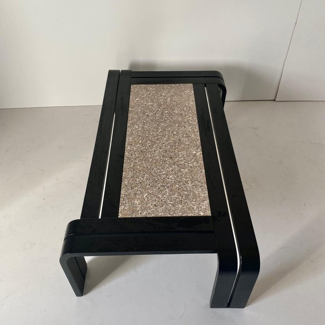 Italian Modern Sculptural Coffee Table with Granite Top & Bentwood Frame, 1980 A striking and sophisticated Italian modern...