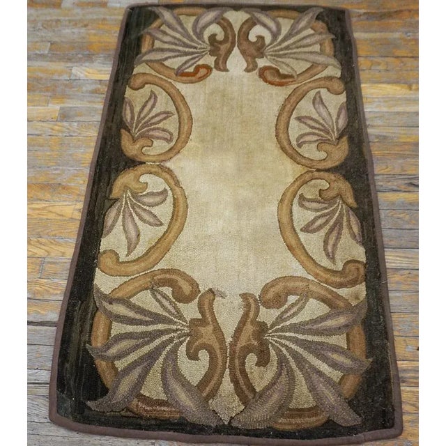 Antique American hooked rug, size: 2'8"x4'10".