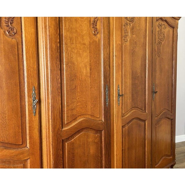 Vintage French Louis XVI Style Carved Oak 4-Door Wardrobe For Sale - Image 11 of 15