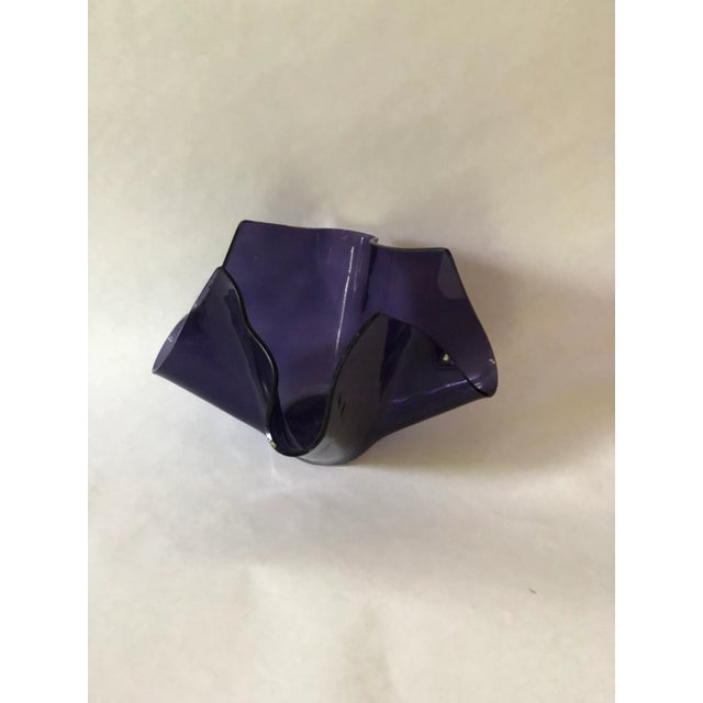 Beautiful moulded glass purple handkerchief vase.