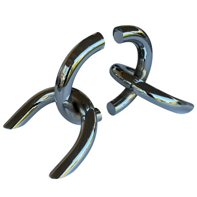 Gorgeous pair of steel and chrome vintage Italian bookends. They are sculptural and functional. They each measure 7” x 6”...