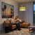 The Tambo Arc Lamp is a Mid-Century Modern floor lamp designed by Peter Morelli in 1984, featuring a satin nickel finish...
